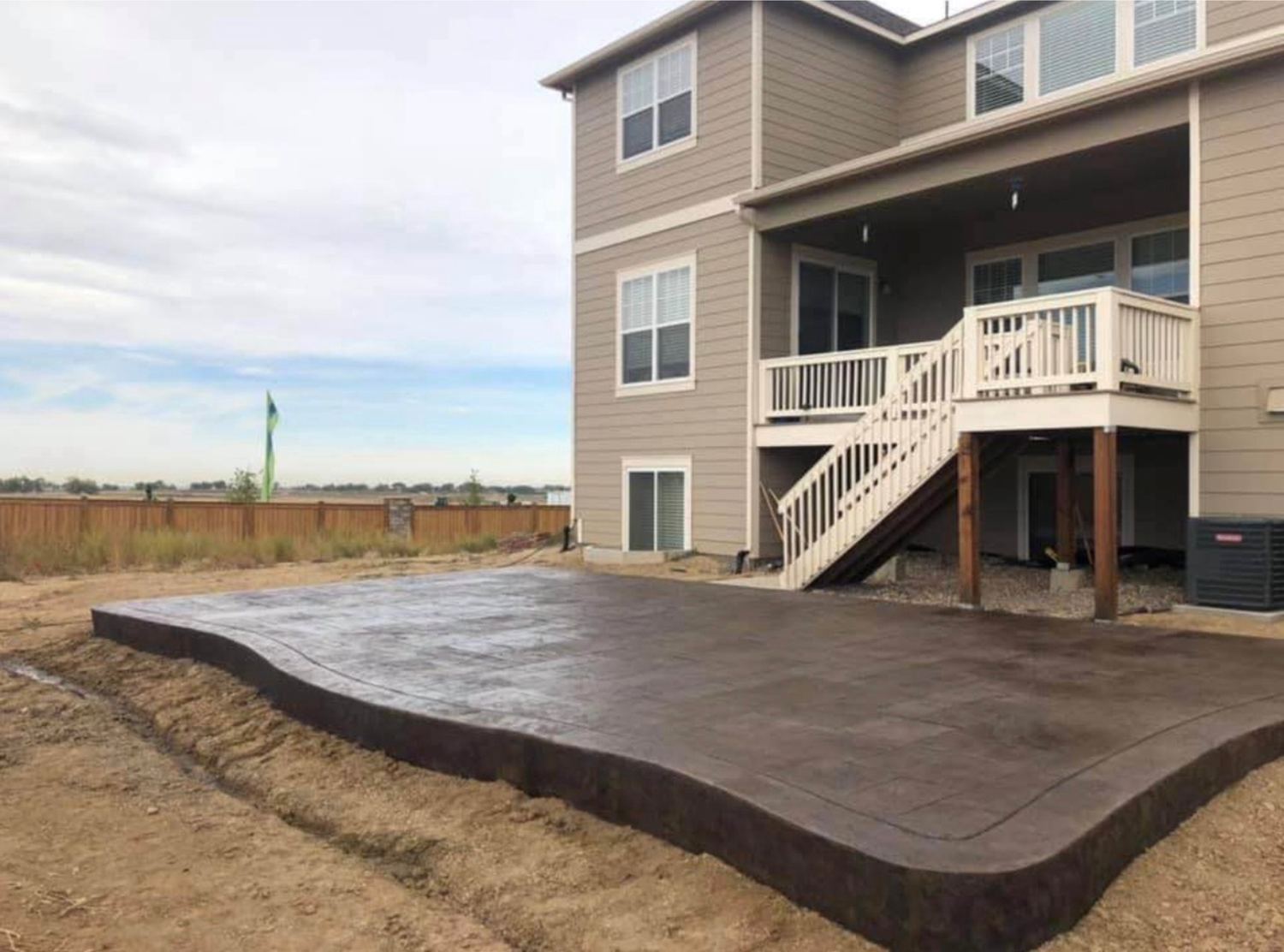 Stamped concrete patio installation for a homeowner in Lakewood, CO.
